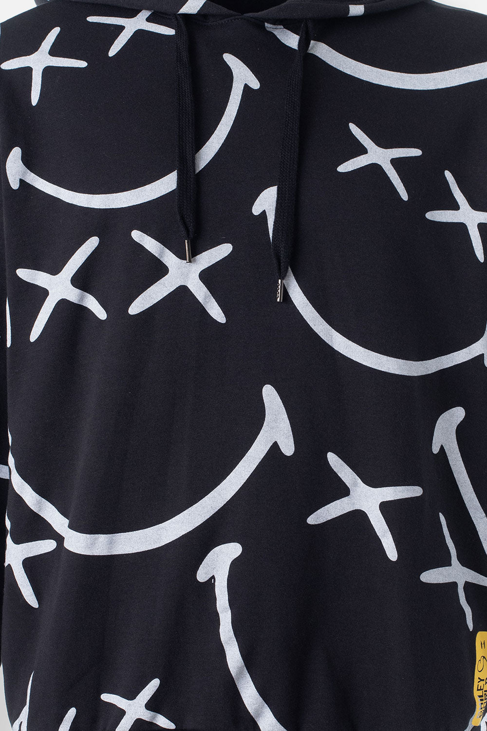 BUZO DE SMILEY NEGRO Y BLANCO CON CAPUCHA GÉNERO NEUTRO