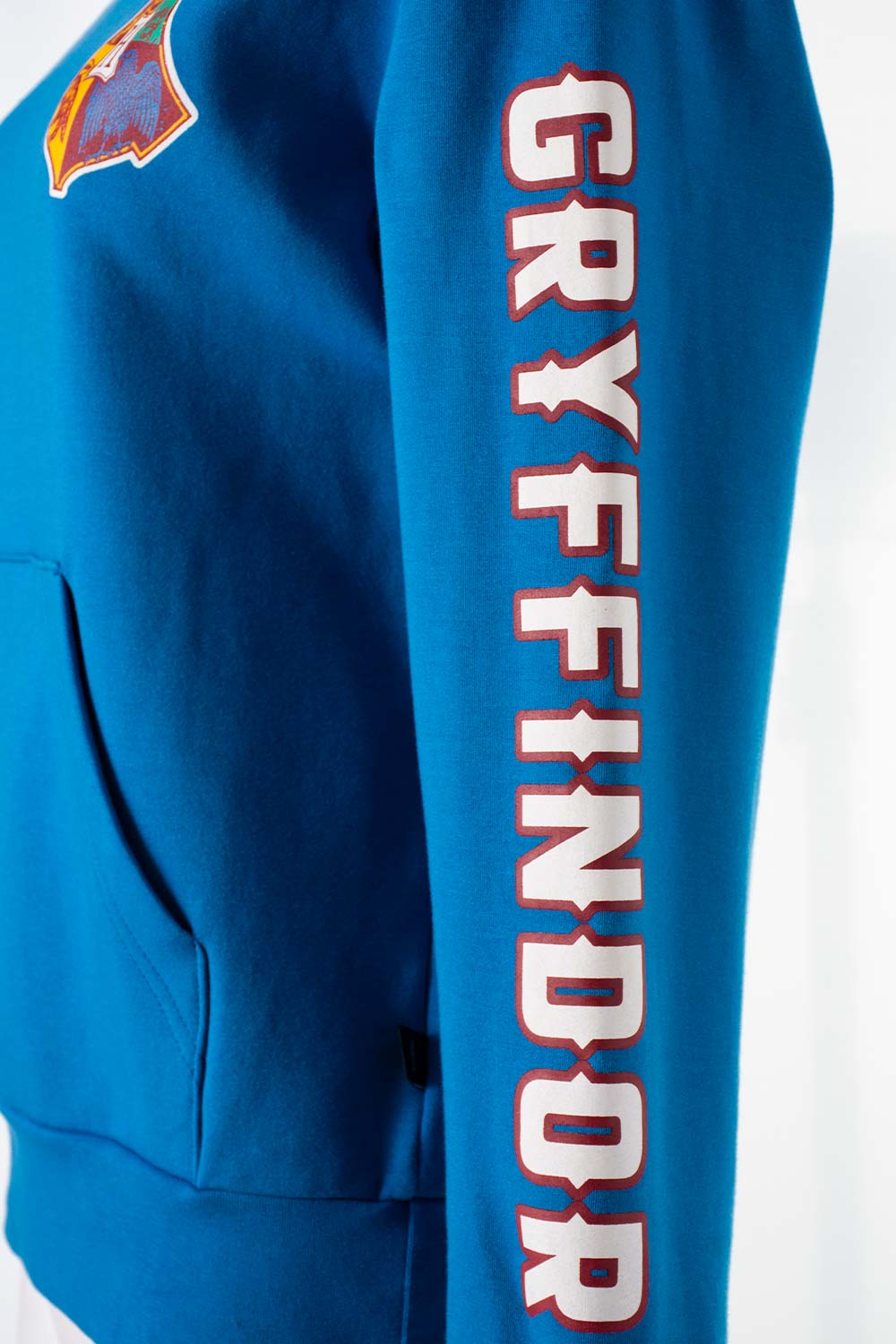 BUZO DE HARRY POTTER AZUL Y VERDE CON CAPUCHA PARA MUJER